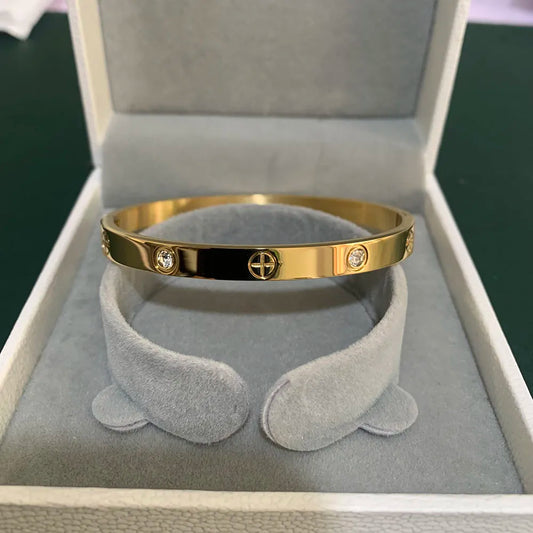 Zircon And Cross Nut Bangle